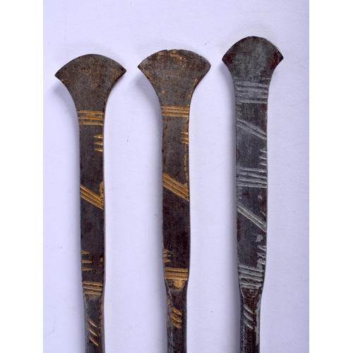 561 - THREE VINTAGE HAND FORGED STABBING SPEARS with axe blade handles. Largest 40 cm long. (3)