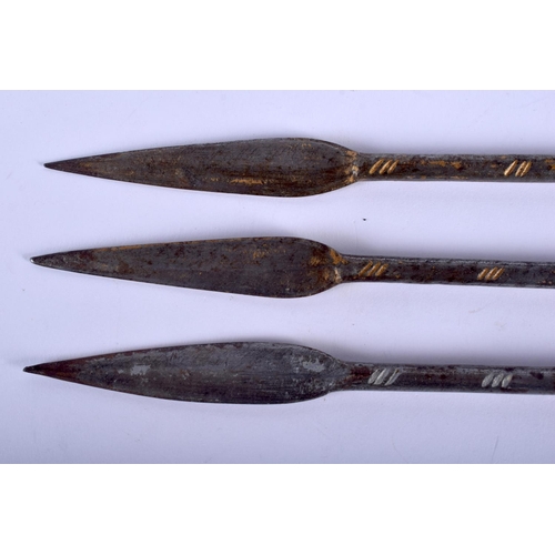 561 - THREE VINTAGE HAND FORGED STABBING SPEARS with axe blade handles. Largest 40 cm long. (3)