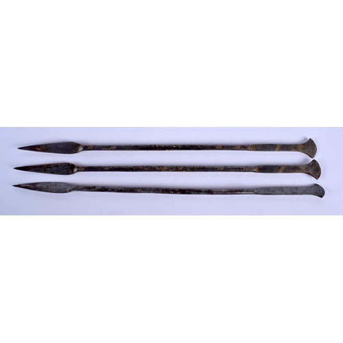 561 - THREE VINTAGE HAND FORGED STABBING SPEARS with axe blade handles. Largest 40 cm long. (3)