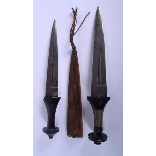 567 - TWO VINTAGE CONTINENTAL KNIVES. 30 cm long. (2)