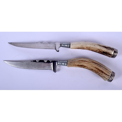 571 - TWO ANTIQUE CONTINENTAL IVORY HANDLED KNIVES together with two others. Largest 40 cm long. (4)