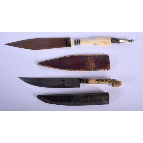 571 - TWO ANTIQUE CONTINENTAL IVORY HANDLED KNIVES together with two others. Largest 40 cm long. (4)