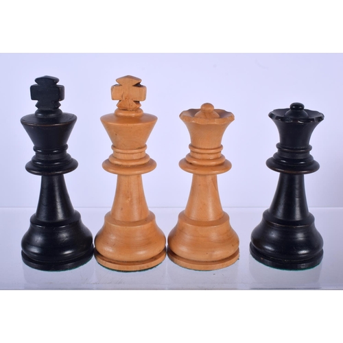 575 - A VINTAGE BOXWOOD AND EBONY CHESS SET together with an early sampler and another. (3)