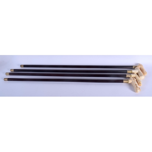 588 - FOUR CONTINENTAL CARVED BONE WALKING CANES with ebonised shafts. Largest 95 cm long. (4)