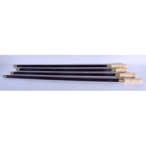 589 - FOUR CONTINENTAL CARVED BONE WALKING CANES with ebonised shafts. Largest 95 cm long. (4)