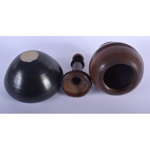 590 - A LARGE ANTIQUE TREEN VASE AND COVER together with a vintage bowl. Largest 34 cm high. (2)