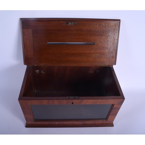 594 - AN EDWARDIAN DESK LETTER BOX together with two stone ashtrays. Largest 30 cm x 16 cm. (3)