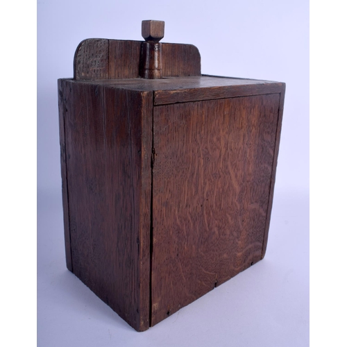 626 - A RARE 19TH CENTURY CONTINENTAL OAK CASED SPINNING AUTOMATON TOY. 25 cm x 16 cm.