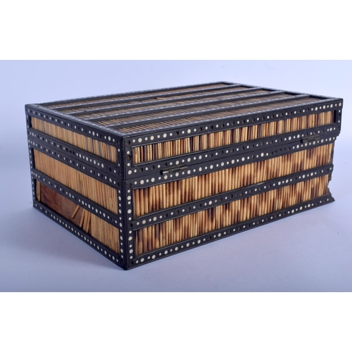 634 - A 19TH CENTURY ANGLO INDIAN PORCUPINE QUILL CASKET the lid rising to reveal a fitted interior. 30 cm... 