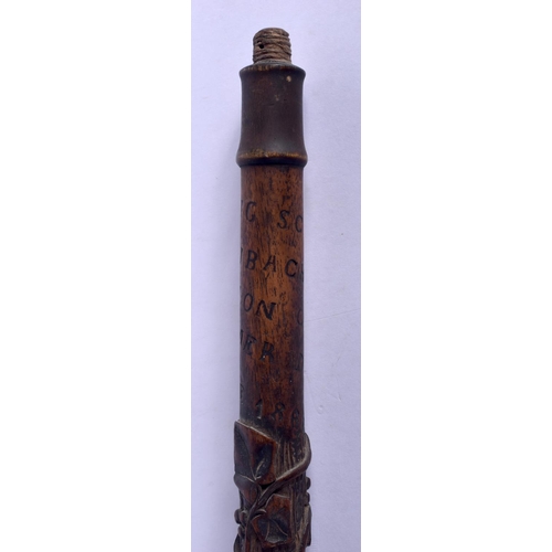 638 - A 19TH CENTURY BAVARIAN BLACK FOREST CARVED WOOD WALKING CANE with rare inscription to the top. 78 c... 