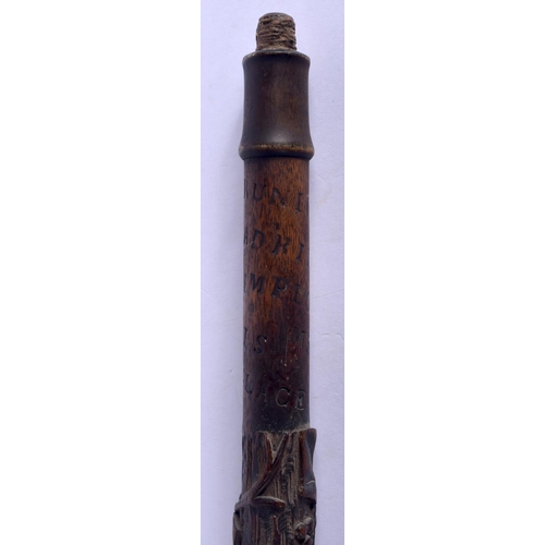 638 - A 19TH CENTURY BAVARIAN BLACK FOREST CARVED WOOD WALKING CANE with rare inscription to the top. 78 c... 