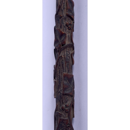 638 - A 19TH CENTURY BAVARIAN BLACK FOREST CARVED WOOD WALKING CANE with rare inscription to the top. 78 c... 