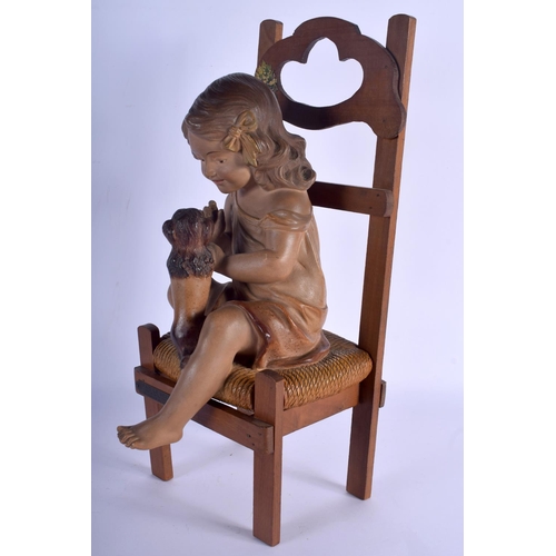 653 - AN EARLY 20TH CENTURY AUSTRIAN COLD PAINTED TERRACOTTA FIGURE OF A GIRL Fais Le Beau. 44 cm x 17 cm.