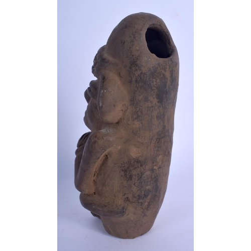 654 - A SOUTH AMERICAN POTTERY ANTIQUITY FIGURAL VESSEL. 18 cm high.