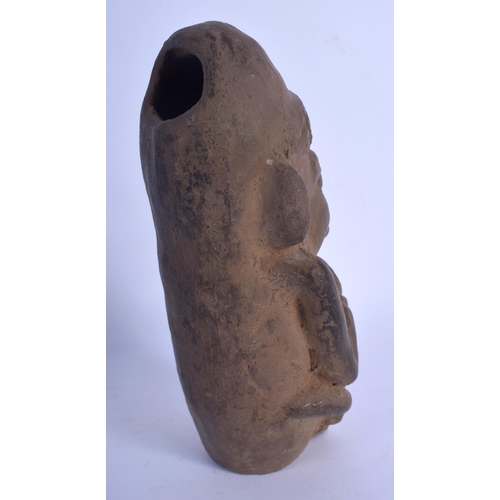 654 - A SOUTH AMERICAN POTTERY ANTIQUITY FIGURAL VESSEL. 18 cm high.