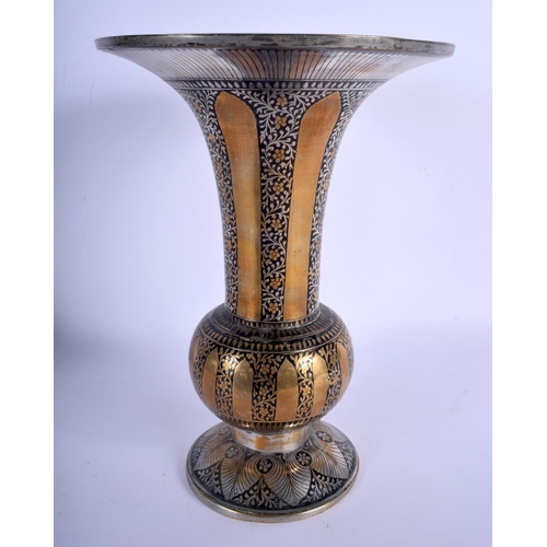 676 - A LARGE ANTIQUE MIDDLE EASTERN BIDRI WARE STYLE VASE decorated with foliage. 27 cm high.