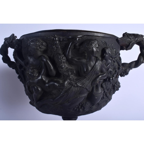 680 - A LARGE PAIR OF 19TH CENTURY EUROPEAN TWIN HANDLED BRONZE URNS decorated in relief with figures. 34 ... 