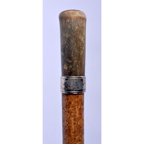 689 - A 19TH CENTURY CONTINENTAL CARVED RHINOCEROS HORN HANDLED WALKING CANE. 83 cm long.