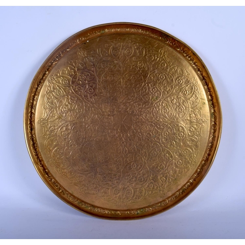 709 - A 19TH CENTURY MIDDLE EASTERN OTTOMAN TYPE MIXED METAL DISH decorated with foliage. 32 cm diameter.