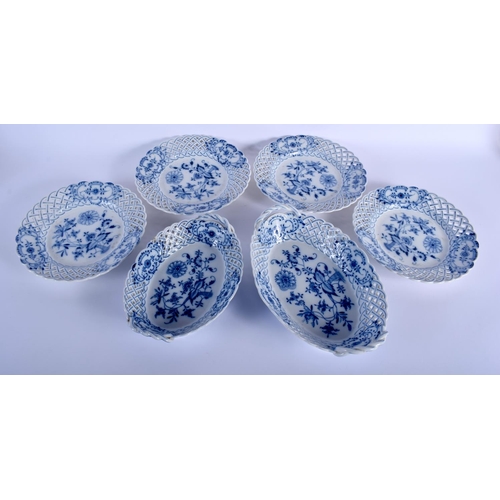 71 - A COLLECTION OF MEISSEN BLUE AND WHITE PORCELAIN  painted with the onion pattern. Largest 27 cm wide... 