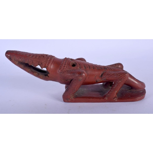 712 - A 19TH CENTURY TURKISH CARVED RED POTTERY CROCODILE BATH RASP. 18 cm x 6 cm.