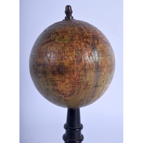 716 - A RARE 19TH CENTURY MAISON FOREST GLOBE TERRESTRE upon an ebonised base. 16 cm x 7 cm.