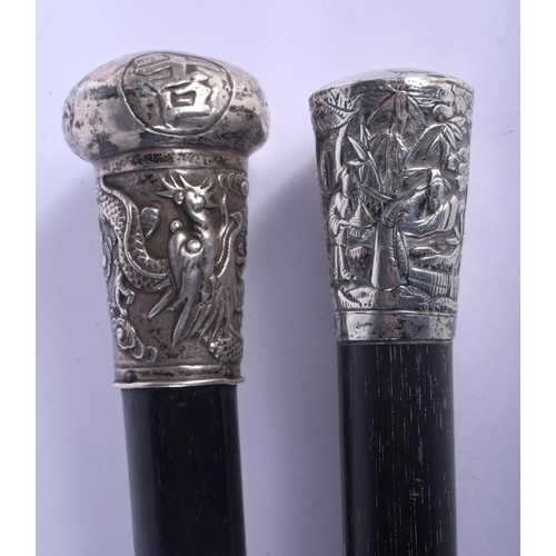 718 - TWO 19TH CENTURY CHINESE EXPORT SILVER AND HARDWOOD CANES. 90 cm long. (2)