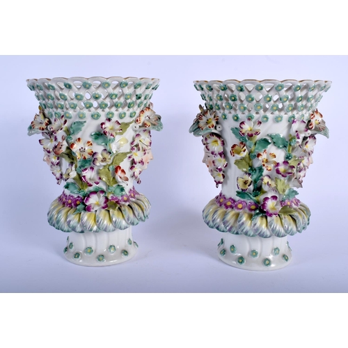 74 - A PAIR OF 19TH CENTURY FRENCH SAMSONS OF PARIS PORCELAIN VASES modelled in the Chelsea Derby style. ... 