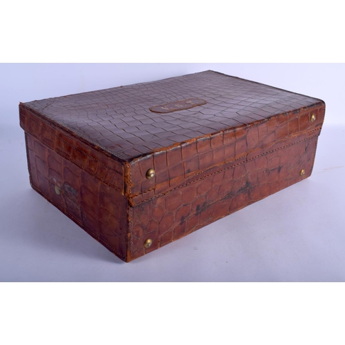 741 - AN ANTIQUE CROCODILE SKIN CASE. 48 cm x 32 cm x 22 cm.