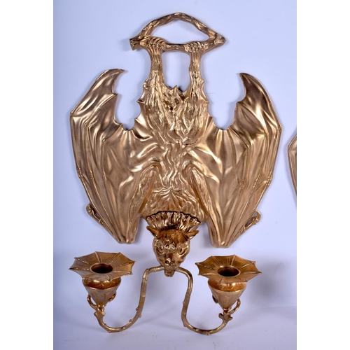 744 - A RARE SET OF FOUR CONTEMPORARY GILT BRONZE BAT WALL SCONCES modelled holding branches in its mouth.... 