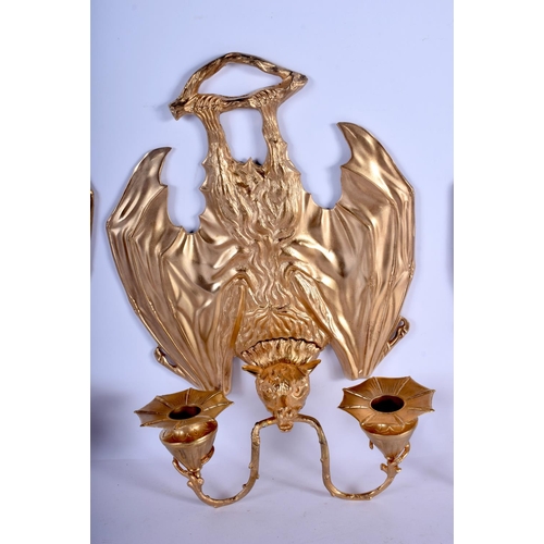 744 - A RARE SET OF FOUR CONTEMPORARY GILT BRONZE BAT WALL SCONCES modelled holding branches in its mouth.... 