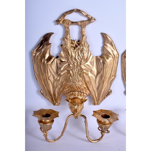 744 - A RARE SET OF FOUR CONTEMPORARY GILT BRONZE BAT WALL SCONCES modelled holding branches in its mouth.... 