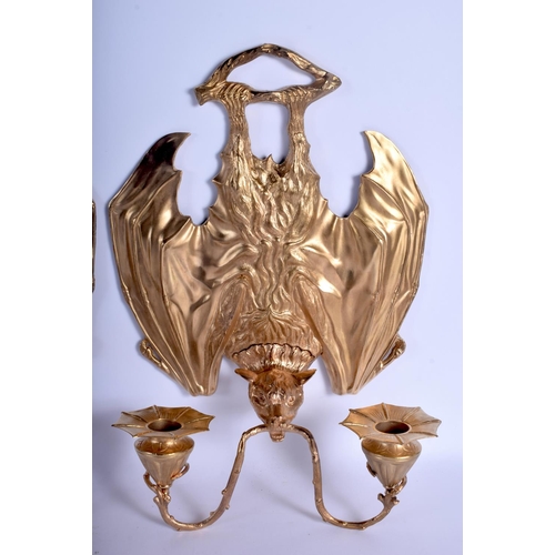 744 - A RARE SET OF FOUR CONTEMPORARY GILT BRONZE BAT WALL SCONCES modelled holding branches in its mouth.... 