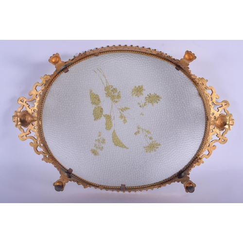 751 - A LARGE 19TH CENTURY FRENCH ORMOLU AND CLEAR GLASS TRAY decorated with gilt foliage. 48 cm x 30 cm.