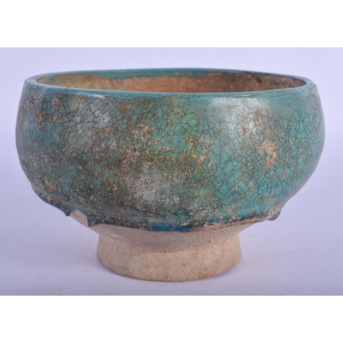 795 - A 19TH CENTURY PERSIAN TURQUOISE GLAZED KASHAN POTTERY BOWL. 13 cm x 9 cm.