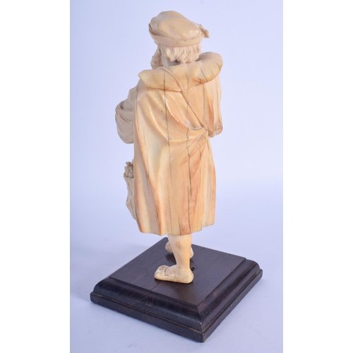 796 - A MID 19TH CENTURY EUROPEAN CARVED DIEPPE IVORY FIGURE OF A CAVALIER modelled roaming holding bottle... 