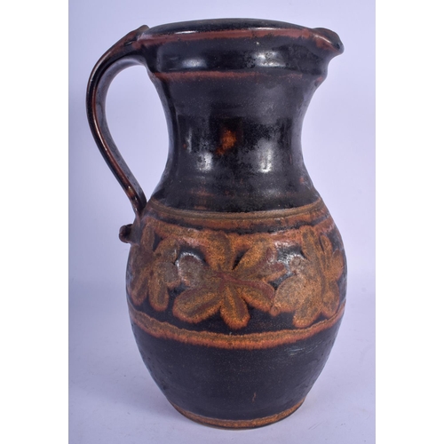 797 - A LARGE EUROPEAN STUDIO POTTERY STONEWARE JUG painted with floral motifs. 27 cm high.