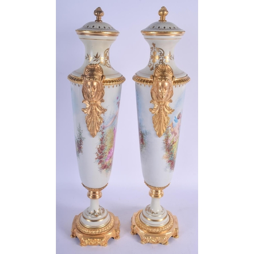 804 - A LARGE PAIR OF CONTEMPORARY CONTINENTAL PORCELAIN VASES AND COVERS Sevres Style. 50 cm high.