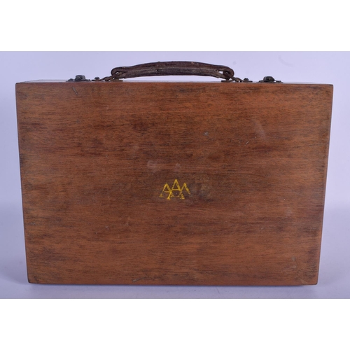 810 - A MINIATURE VINTAGE SUITCASE containing 34 pairs of spectacles. (35)