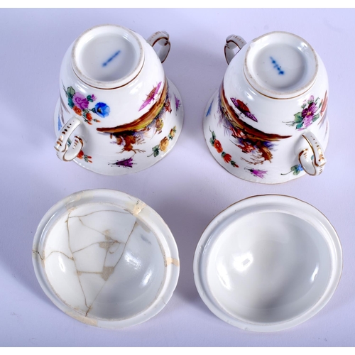 82 - A PAIR OF 19TH CENTURY KPM PORCELAIN TWIN HANDLED TREMBLEUSE CUPS AND SAUCERS painted with animals a... 