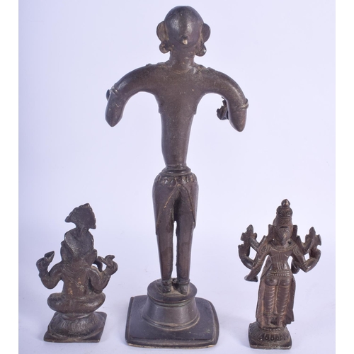 823 - AN 18TH/19TH CENTURY INDIAN BRONZE FIGURE OF A BUDDHISTIC DEITY together with two others. Largest 23... 