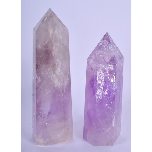 828 - TWO CONTINENTAL CARVED AMETHYST OBELISKS. Largest 13 cm high. (2)