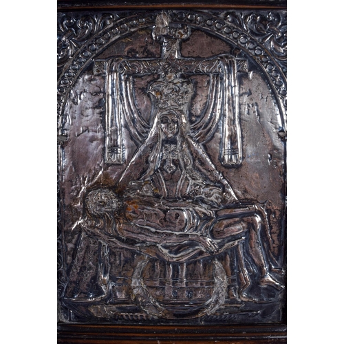 830 - AN EXTREMELY RARE 18TH CENTURY CARVED TORTOISESHELL SILVER MOUNTED ICON depicting a central panel of... 