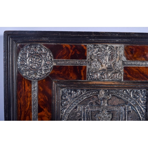 830 - AN EXTREMELY RARE 18TH CENTURY CARVED TORTOISESHELL SILVER MOUNTED ICON depicting a central panel of... 