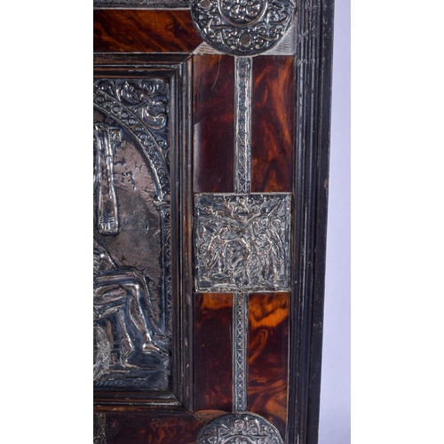 830 - AN EXTREMELY RARE 18TH CENTURY CARVED TORTOISESHELL SILVER MOUNTED ICON depicting a central panel of... 