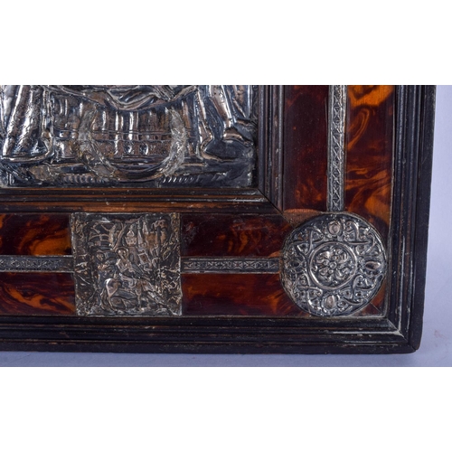 830 - AN EXTREMELY RARE 18TH CENTURY CARVED TORTOISESHELL SILVER MOUNTED ICON depicting a central panel of... 