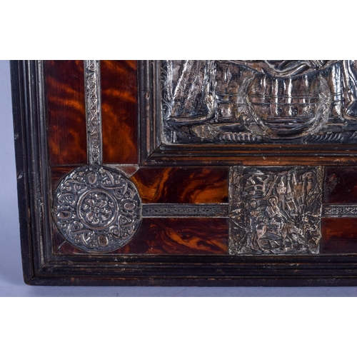 830 - AN EXTREMELY RARE 18TH CENTURY CARVED TORTOISESHELL SILVER MOUNTED ICON depicting a central panel of... 