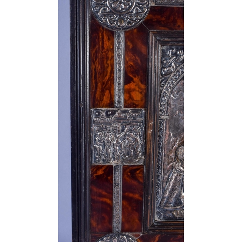 830 - AN EXTREMELY RARE 18TH CENTURY CARVED TORTOISESHELL SILVER MOUNTED ICON depicting a central panel of... 