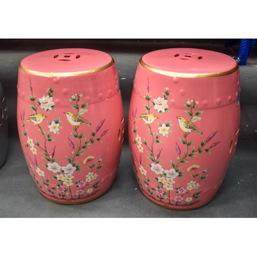 832 - A PAIR OF CONTEMPORARY CONTINENTAL PORCELAIN BARREL SEATS. 40 cm x 26 cm.