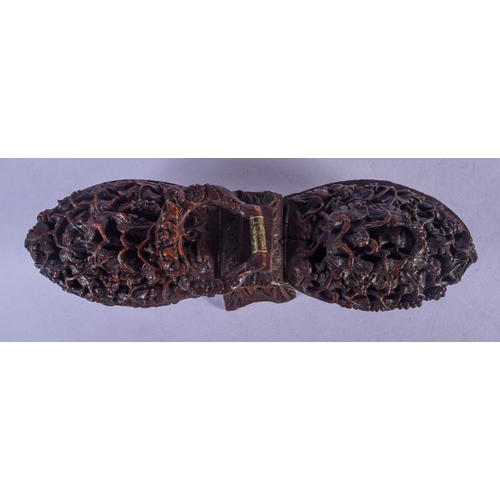 836 - AN EARLY 19TH CENTURY FRENCH CARVED COQUILLA NUT DOUBLE BO decorated with vines and foliage. 14 cm w... 